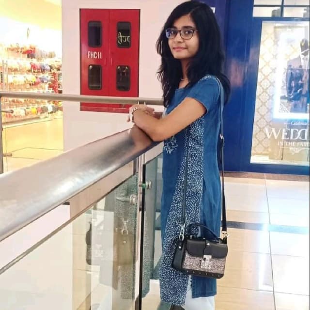 Aarthi K.