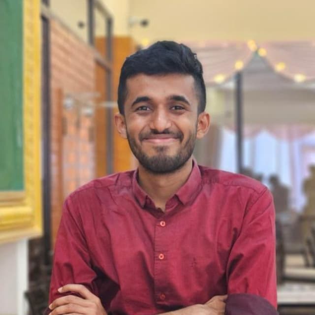 Adhil E