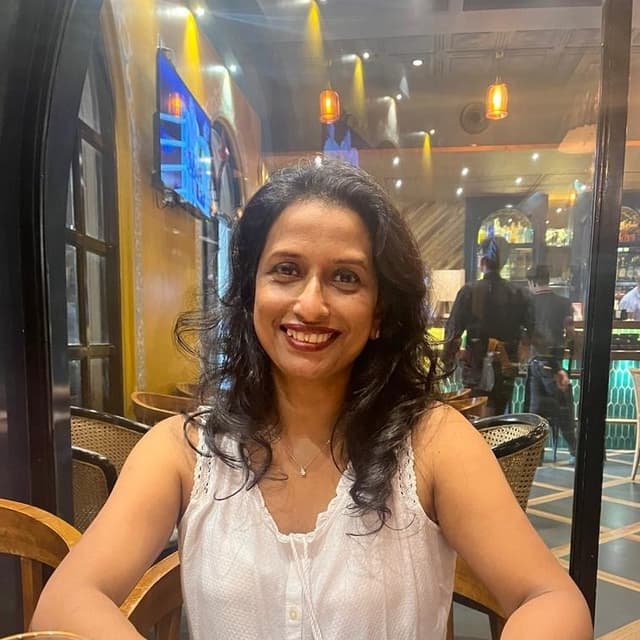 Asha Nair , PMP