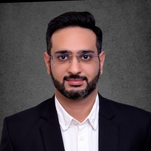 Nikhil C.