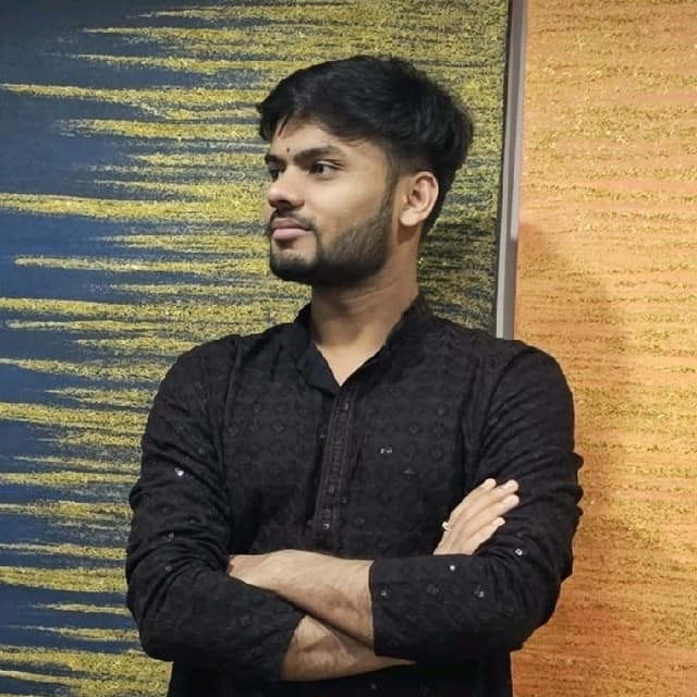 DEVANSH J.