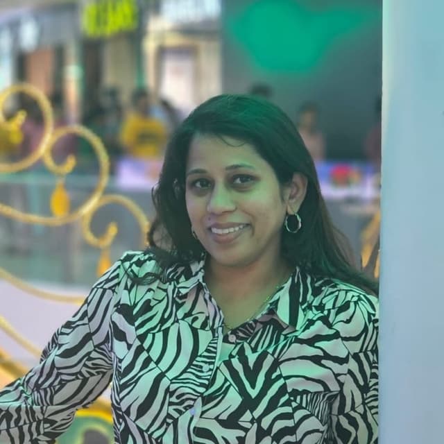Dhanashree A E