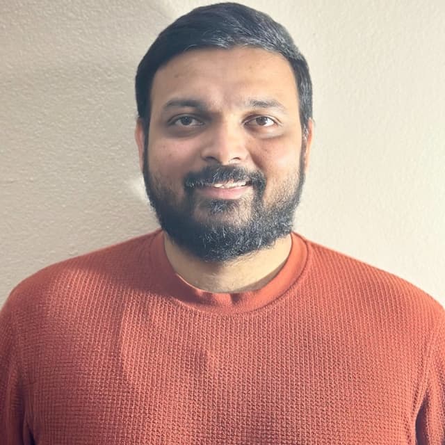 Dharmesh N