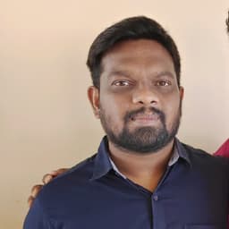Dinesh M