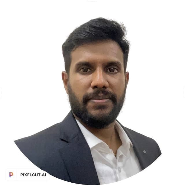 Dinesh M.