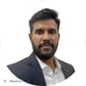 Dinesh M.