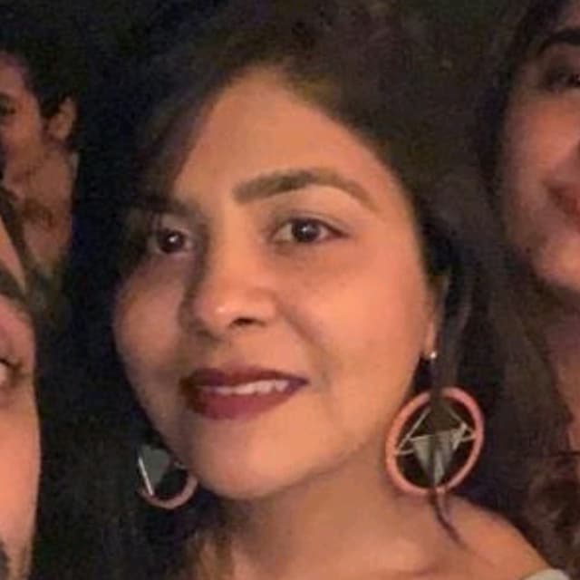 Dinisha R.