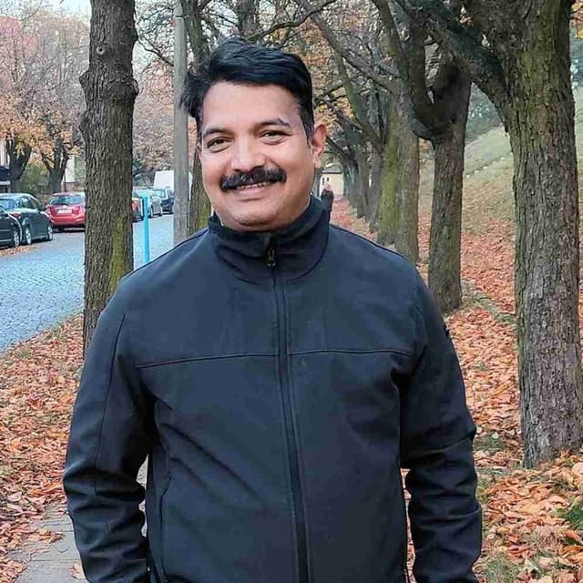 Dr. Mahesh B