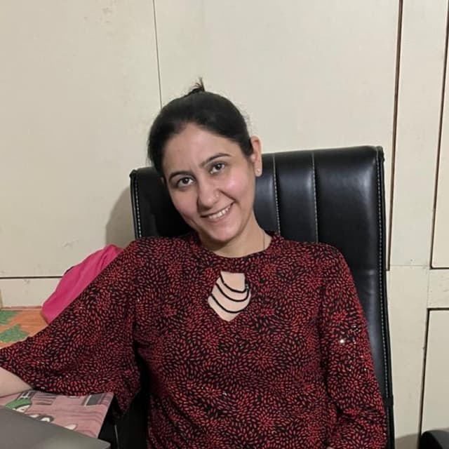 Komal C.