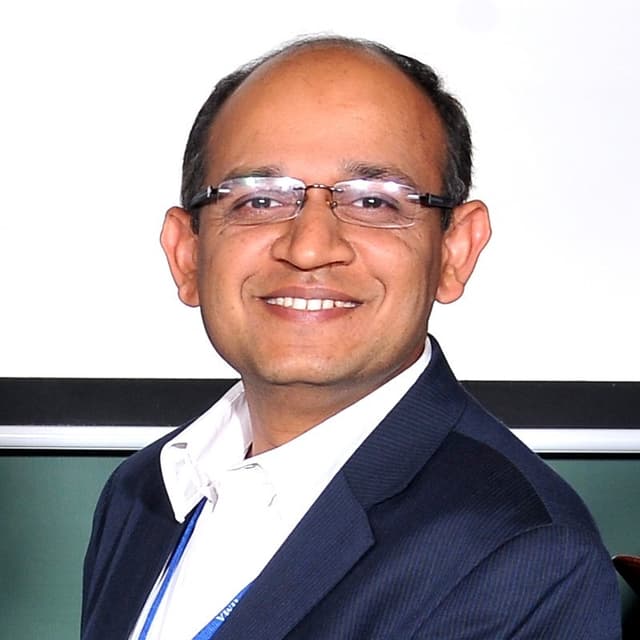 Mangesh A.