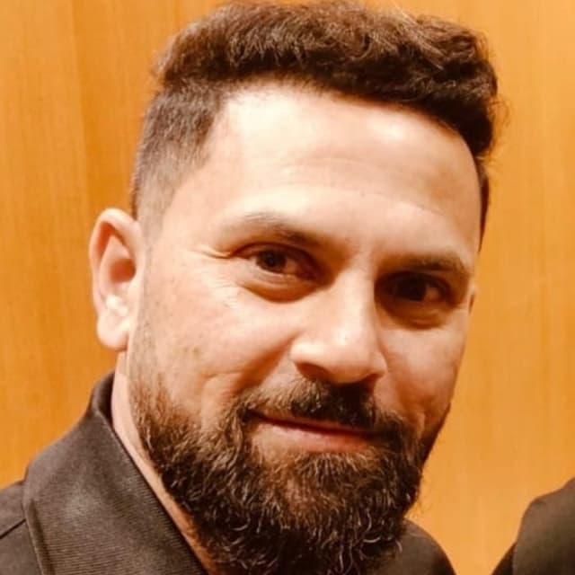 Gautam M.