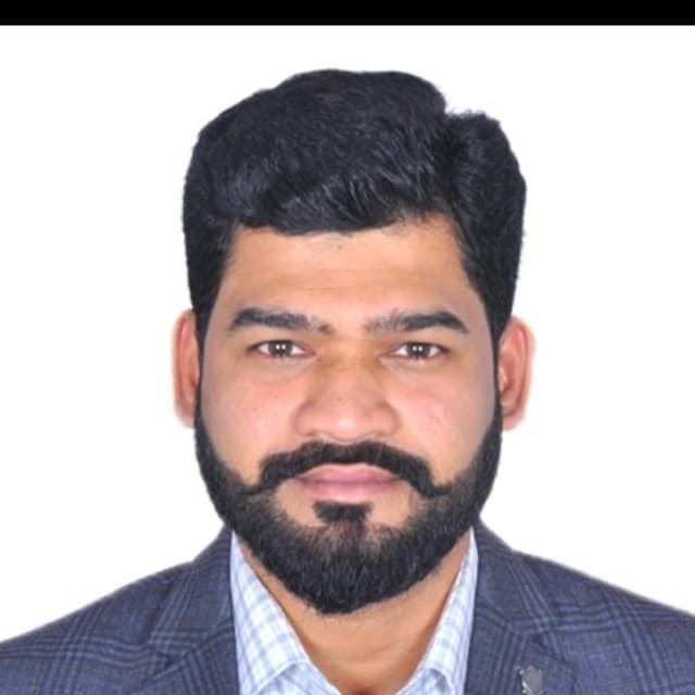 Mukesh K M.