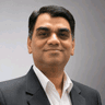 Naveen K.