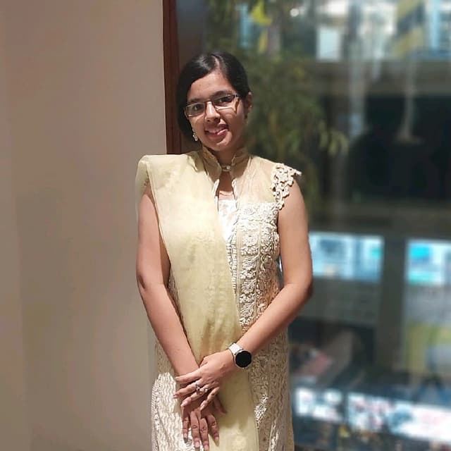 Nidhi S