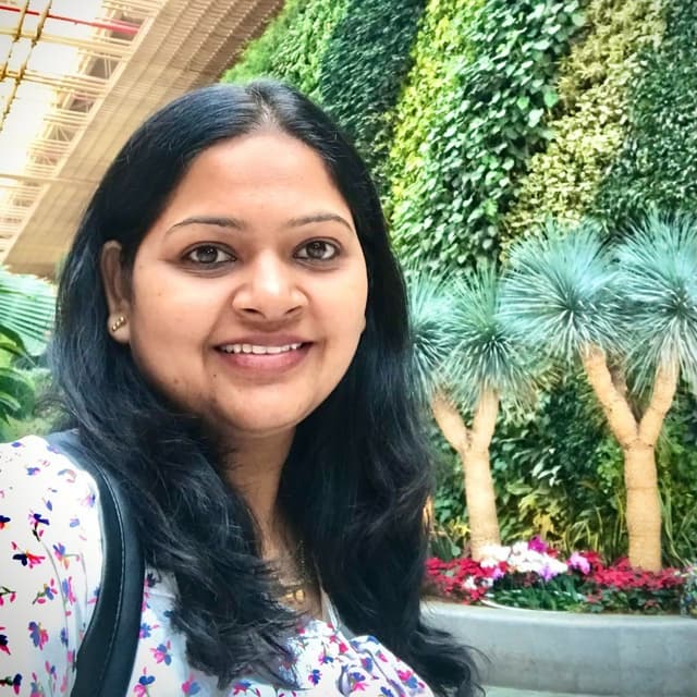 Nisha M