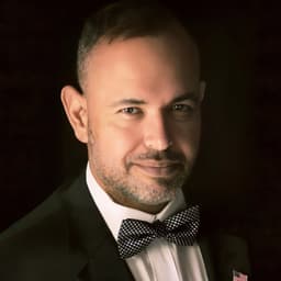 Dr. Paul de Souza