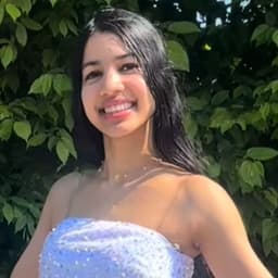 Rhea M.