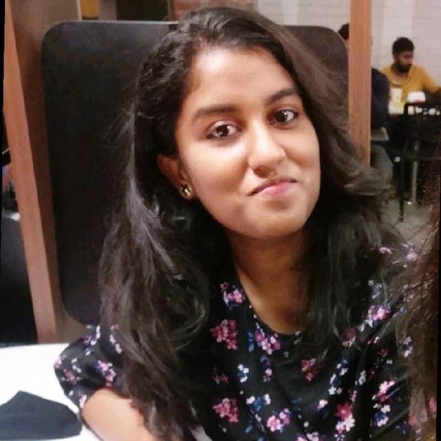 Suharika K